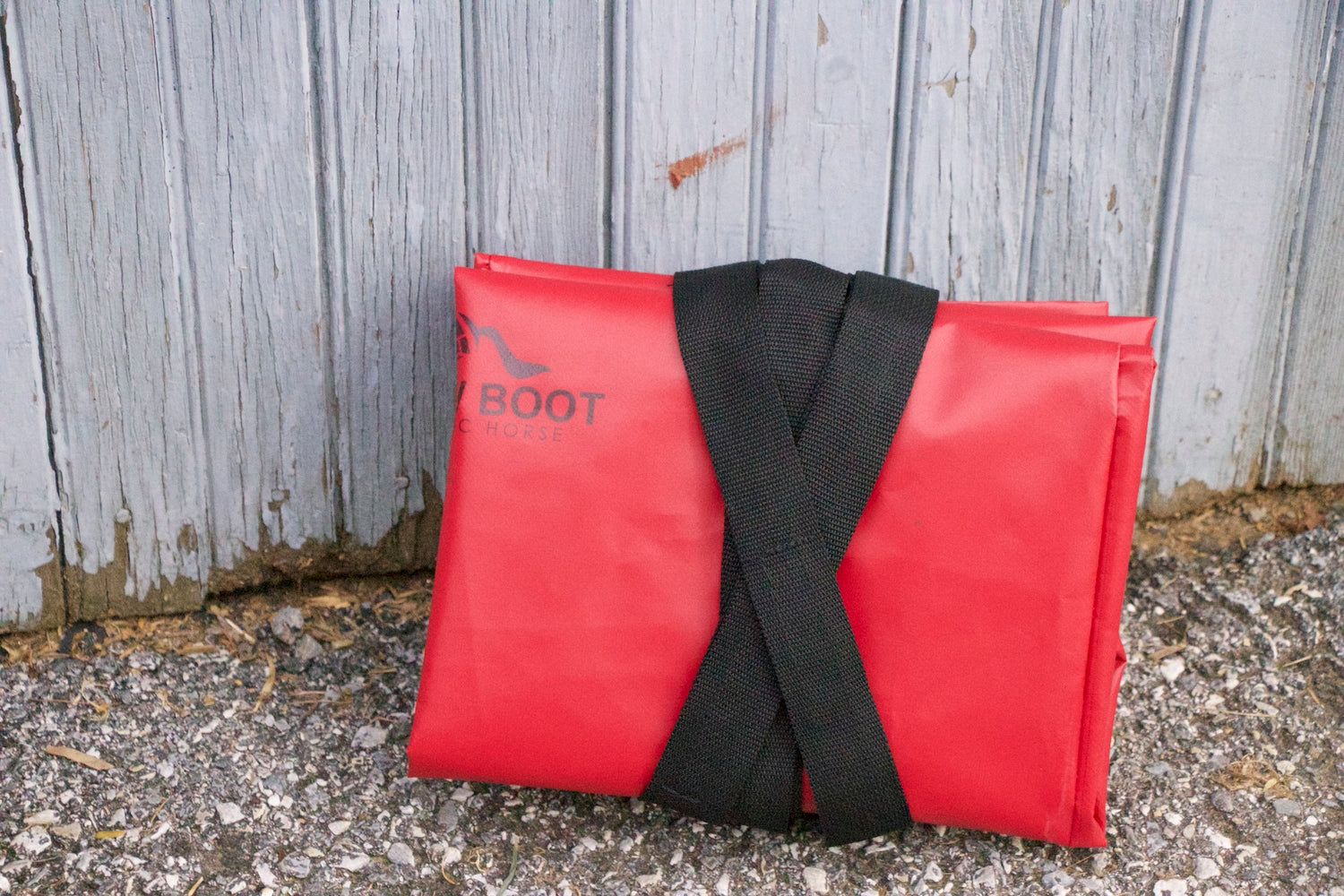Cold therapy boots for horses by soaking horse legs in ice water.